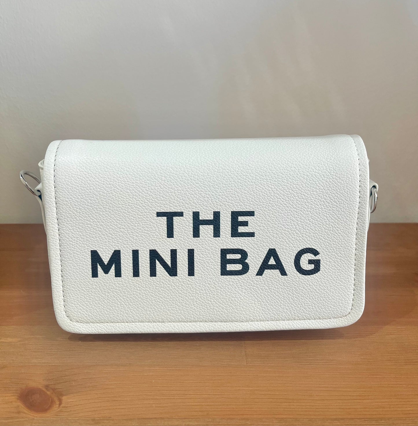 The mini cross body bag